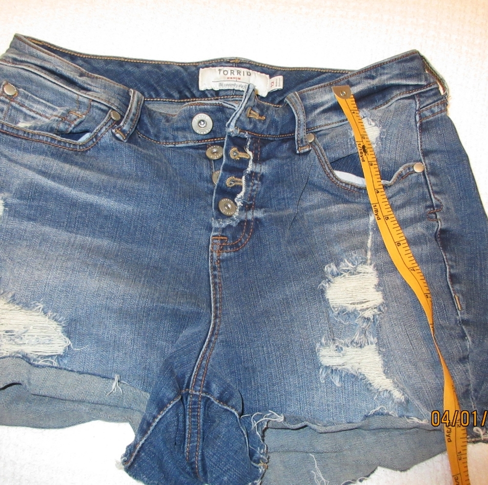 Torrid button fly destressed jean shorts